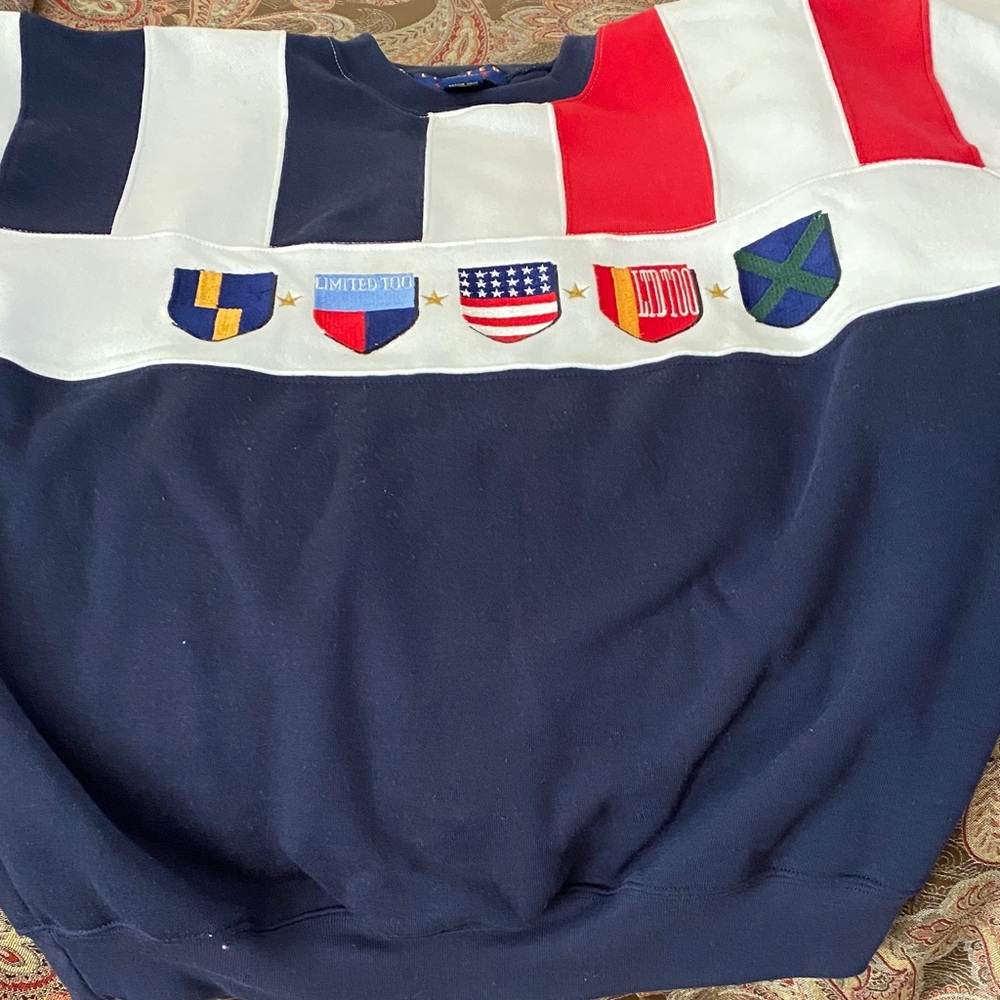 Navy and Red Crewneck Sweat shirt. This is limited too brand.